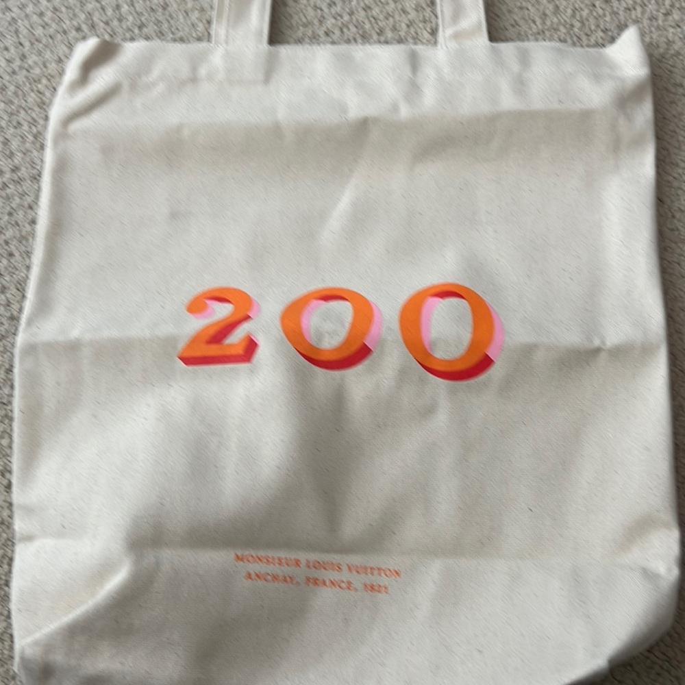 Louis Vuitton- 200th anniversary trunks tote bag. Add to your Louis Collection!